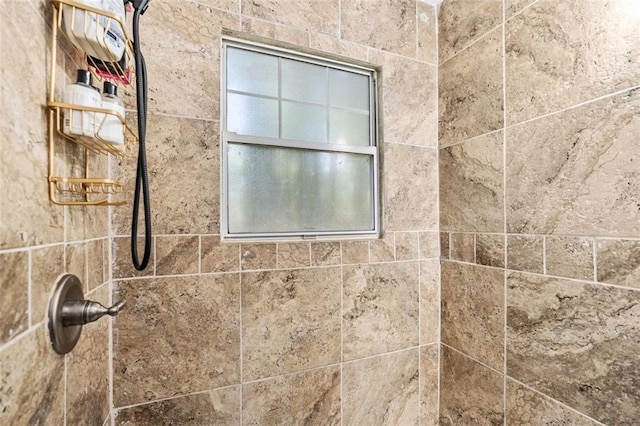 details with a tile shower