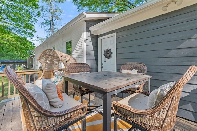 deck featuring outdoor dining space