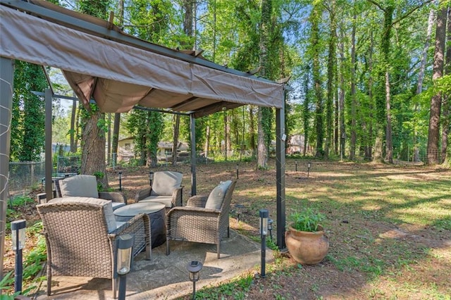view of yard featuring fence and a patio area