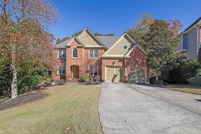 view of front of property with a garage and a front lawn