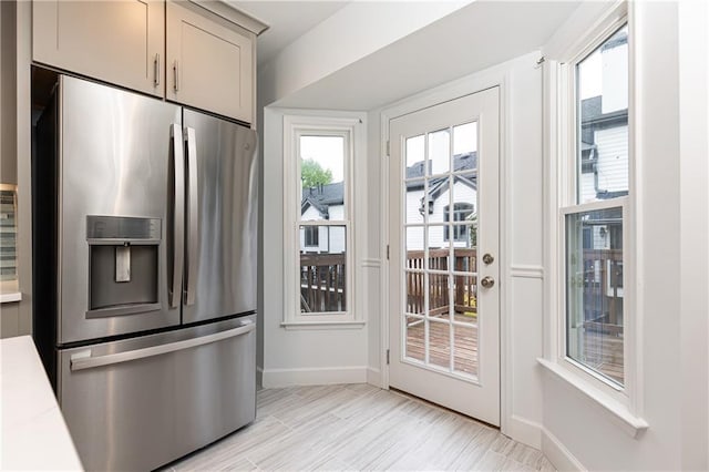 entryway featuring baseboards