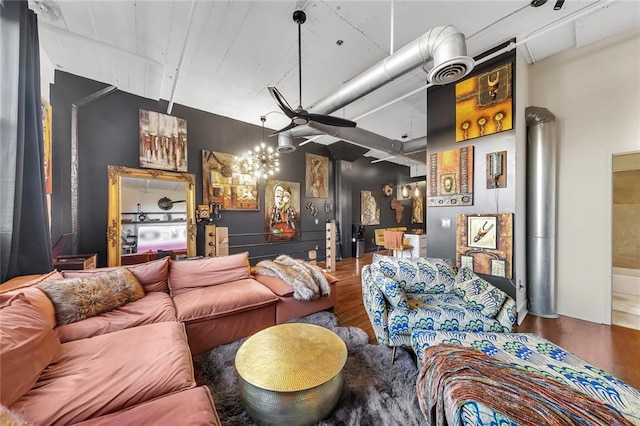 living room featuring hardwood / wood-style floors and a notable chandelier