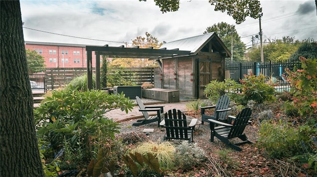 view of patio with an outbuilding