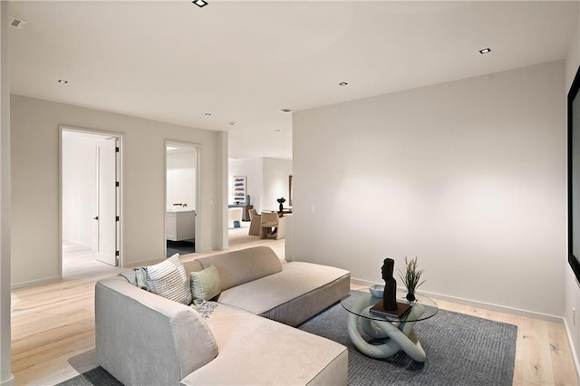 living room featuring light hardwood / wood-style flooring