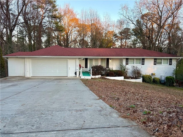 single story home with a garage