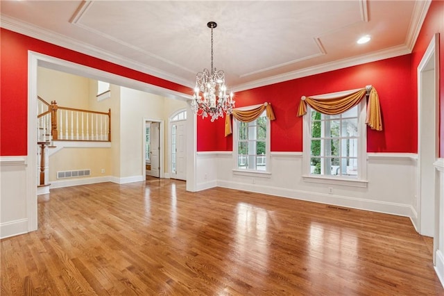 220 Spring Branch Dr, Canton, GA 30115 - unfurnished room with a chandelier, wood finished floors, wainscoting, and crown molding