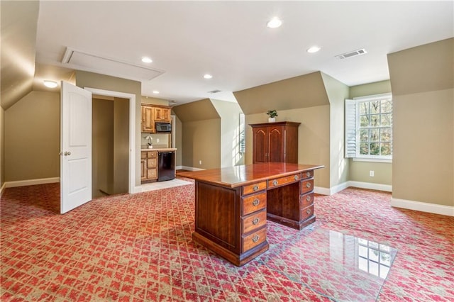 carpeted home office featuring sink