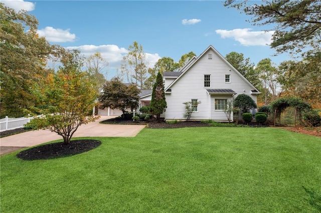 view of home's exterior featuring a yard