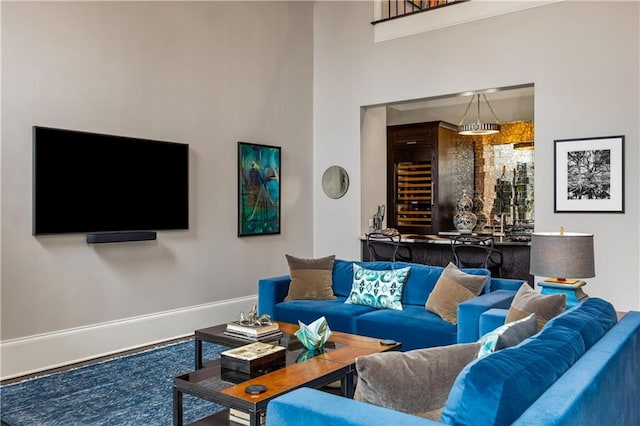 living room featuring a high ceiling