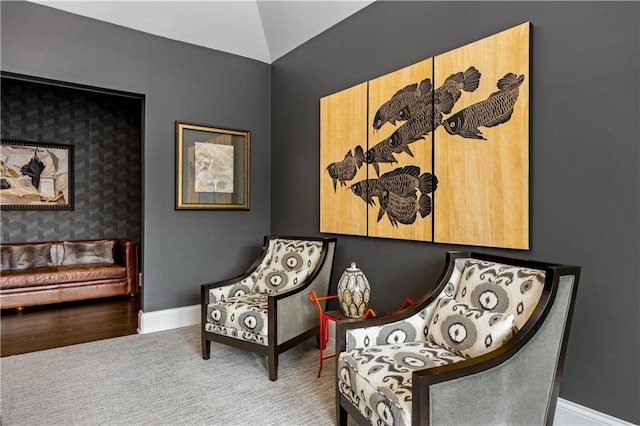 sitting room featuring carpet floors