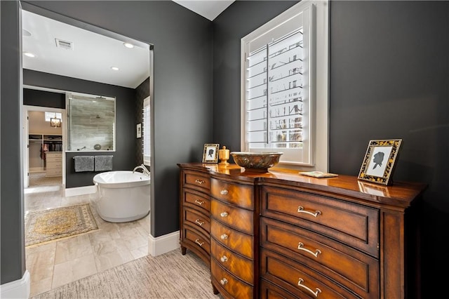 bathroom with a bathing tub