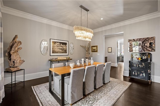 dining area featuring an inviting chandelier, ornamental molding, and dark hardwood / wood-style floors