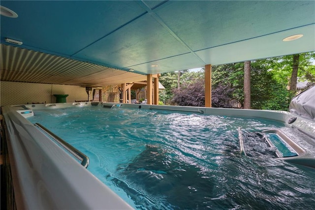1703 Brandywine Ct, Atlanta, GA 30338 - view of swimming pool featuring a hot tub, a pool, and heating fuel