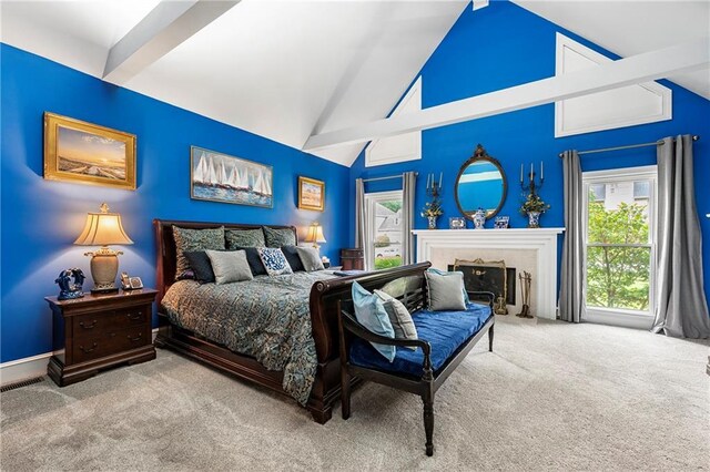 1703 Brandywine Ct, Atlanta, GA 30338 - carpeted bedroom with multiple windows, high vaulted ceiling, beamed ceiling, and a fireplace with flush hearth