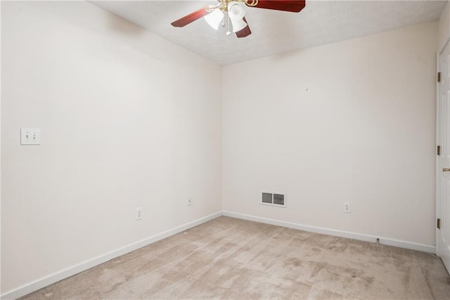 605 Pebble Blvd, Covington, GA 30016 - unfurnished room with ceiling fan, baseboards, light carpet, and a textured ceiling
