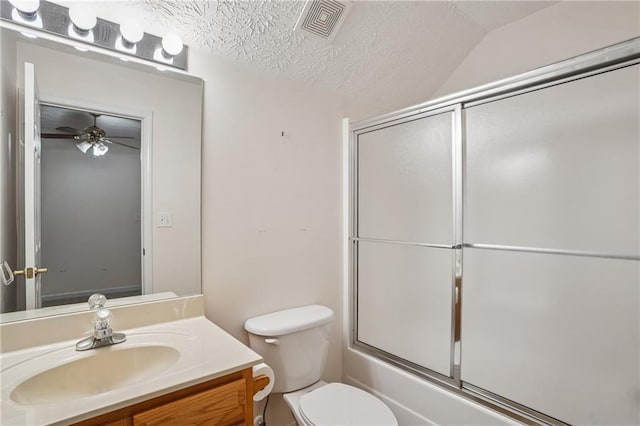 605 Pebble Blvd, Covington, GA 30016 - full bathroom featuring vanity, toilet, shower / bath combination with glass door, ceiling fan, and lofted ceiling