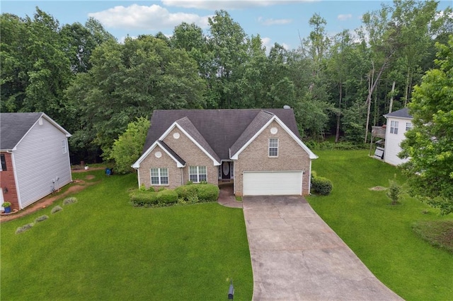 605 Pebble Blvd, Covington, GA 30016 - view of front facade with brick siding, concrete driveway, and a front yard