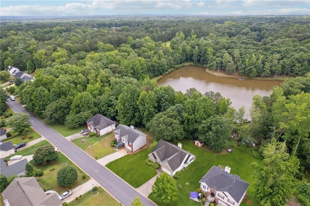 605 Pebble Blvd, Covington, GA 30016 - aerial overview of property's location with a forest, a nearby body of water, and nearby suburban area