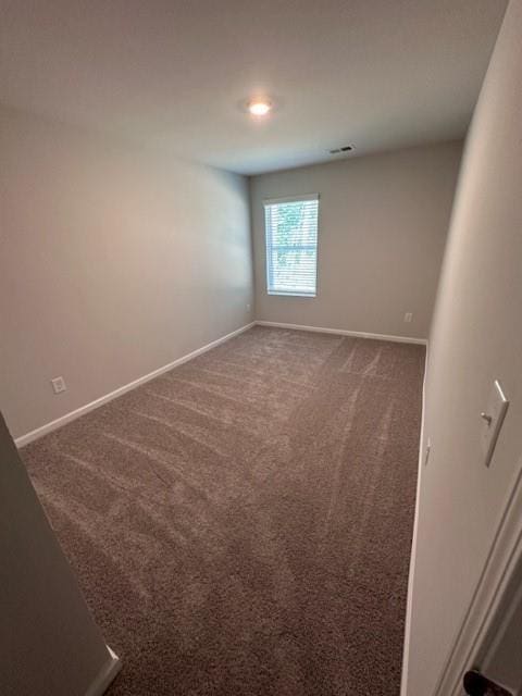 543 Courthouse Park Dr, Temple, GA 30179 - carpeted spare room with baseboards