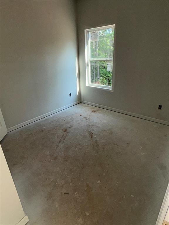 543 Courthouse Park Dr, Temple, GA 30179 - unfurnished room featuring unfinished concrete flooring and baseboards