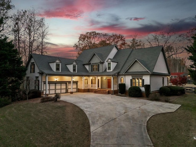 view of front of house with a lawn and covered porch