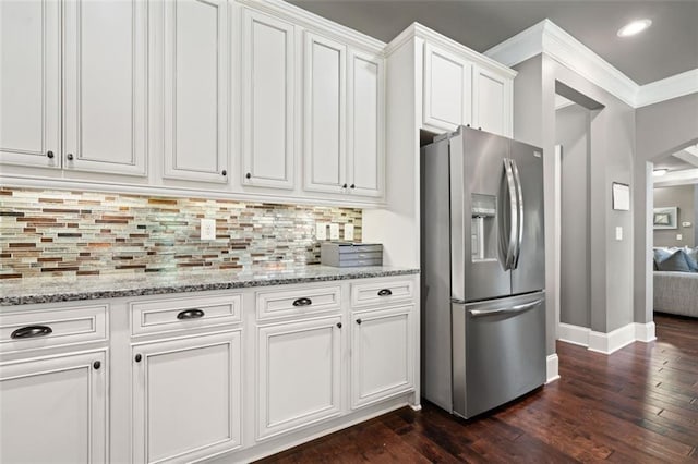161 Archstone Sq, Mcdonough, GA 30253 - kitchen featuring stainless steel fridge with ice dispenser, baseboards, dark wood-type flooring, white cabinets, and decorative backsplash