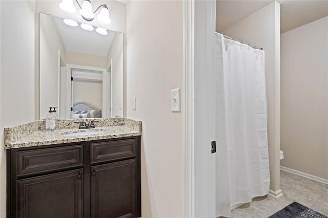 161 Archstone Sq, Mcdonough, GA 30253 - bathroom featuring connected bathroom, vanity, toilet, and baseboards