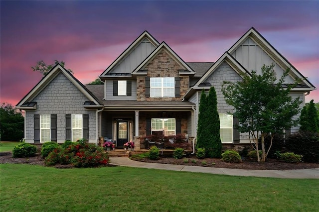 161 Archstone Sq, Mcdonough, GA 30253 - craftsman-style home featuring a porch, a front yard, and board and batten siding