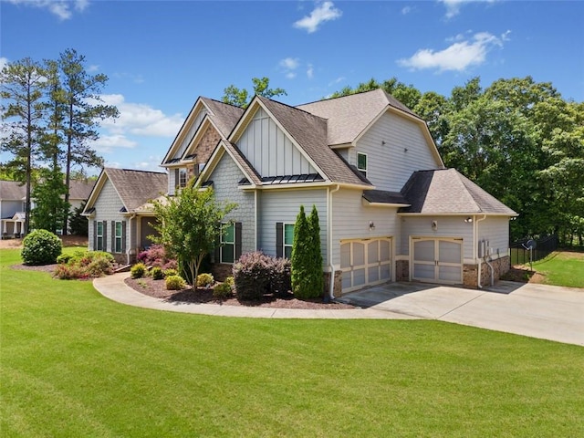 161 Archstone Sq, Mcdonough, GA 30253 - view of front of home with board and batten siding, concrete driveway, a front lawn, and a shingled roof