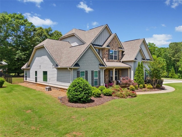 161 Archstone Sq, Mcdonough, GA 30253 - view of property exterior with board and batten siding and a shingled roof