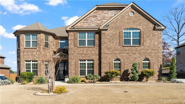 view of front of property with brick siding