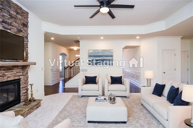 kitchen featuring decorative light fixtures, a center island, white cabinets, and appliances with stainless steel finishes