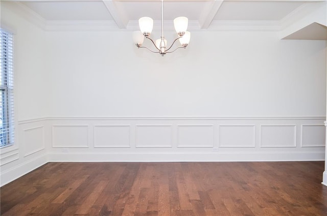 unfurnished room with beam ceiling, dark hardwood / wood-style floors, ornamental molding, and a chandelier