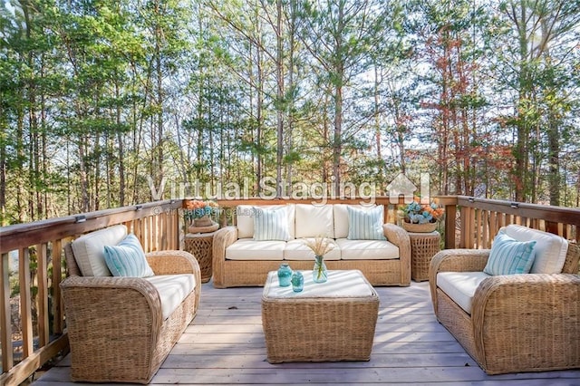 wooden terrace featuring outdoor lounge area