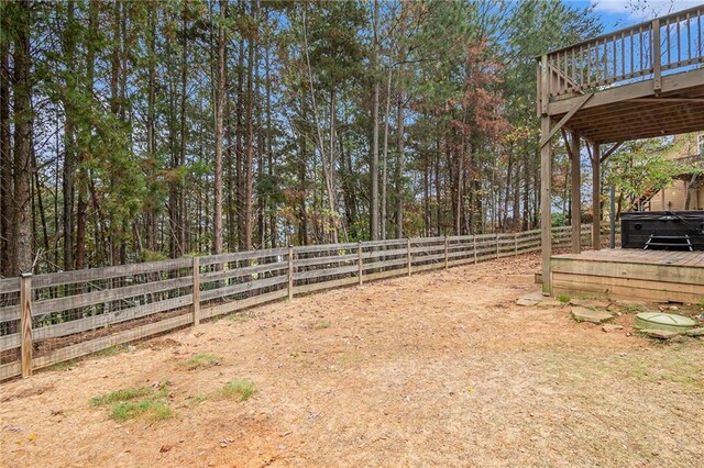 view of yard with a deck