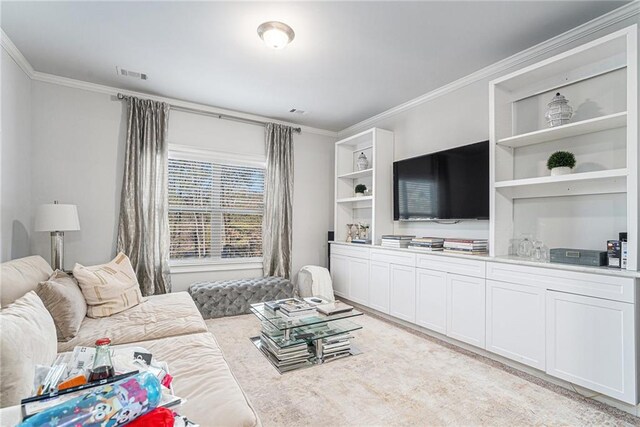 living room with ornamental molding