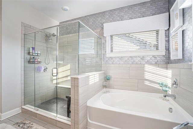 bathroom with independent shower and bath