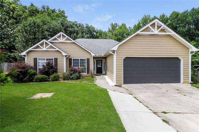 ranch-style house featuring a garage