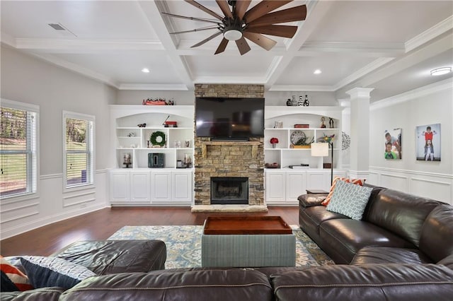 living room with coffered ceiling, dark wood-style flooring, crown molding, a ceiling fan, and beam ceiling