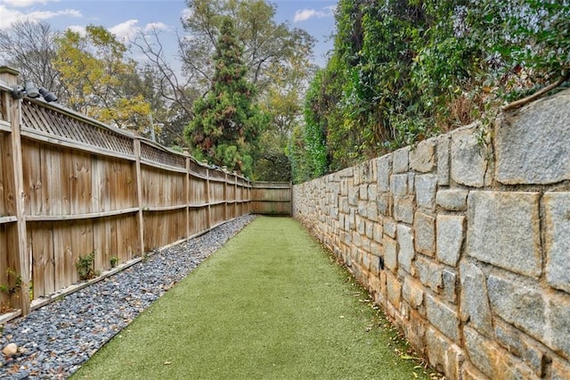 view of yard featuring a fenced backyard