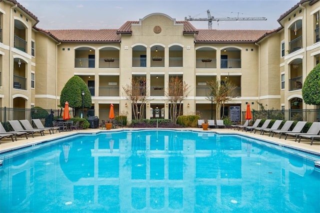 community pool with fence