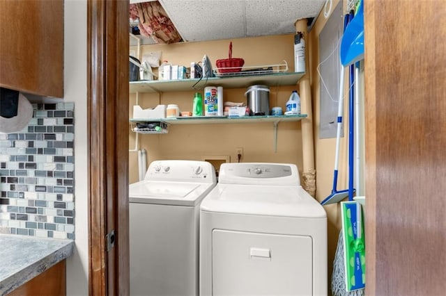 laundry area with laundry area and independent washer and dryer