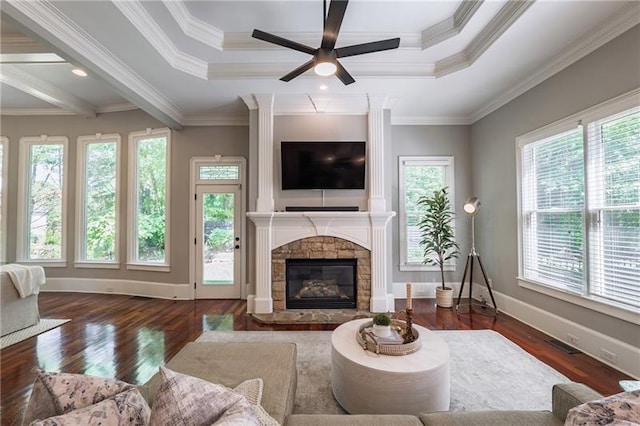 3680 Milton Park Dr, Alpharetta, GA 30022 - living area featuring wood finished floors, a fireplace, ceiling fan, baseboards, and ornamental molding