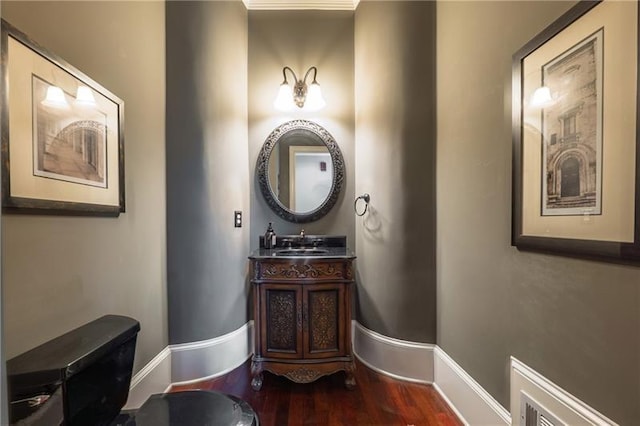 3680 Milton Park Dr, Alpharetta, GA 30022 - bathroom featuring wood finished floors, baseboards, and vanity