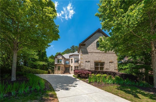 3680 Milton Park Dr, Alpharetta, GA 30022 - view of front of property with stone siding and a balcony