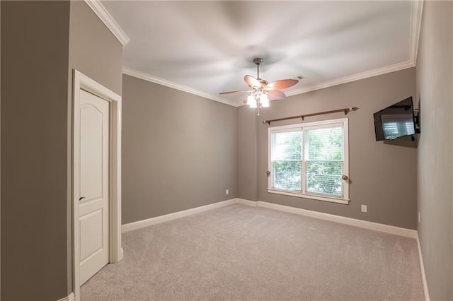 3680 Milton Park Dr, Alpharetta, GA 30022 - empty room with light carpet, ceiling fan, baseboards, and crown molding