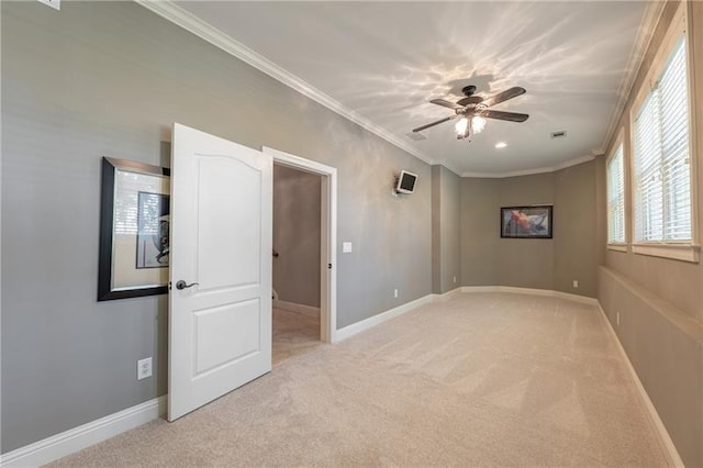 3680 Milton Park Dr, Alpharetta, GA 30022 - spare room featuring light colored carpet, ornamental molding, ceiling fan, and baseboards