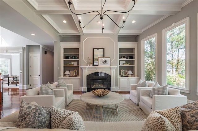 3680 Milton Park Dr, Alpharetta, GA 30022 - living room with healthy amount of natural light, crown molding, coffered ceiling, a high end fireplace, and light wood-style flooring