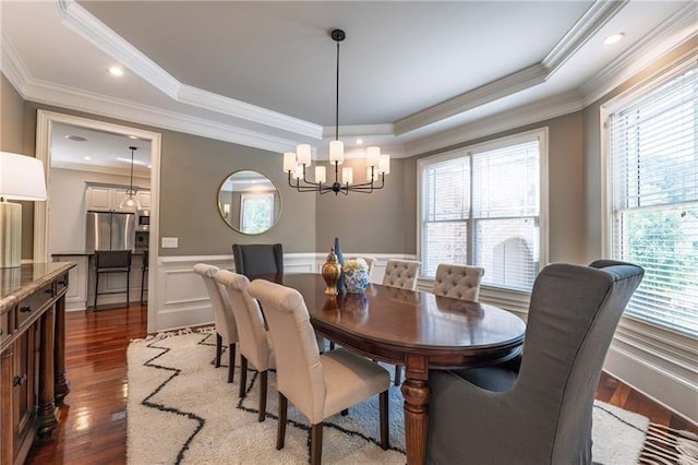 3680 Milton Park Dr, Alpharetta, GA 30022 - dining area with a chandelier, a raised ceiling, healthy amount of natural light, crown molding, and wainscoting