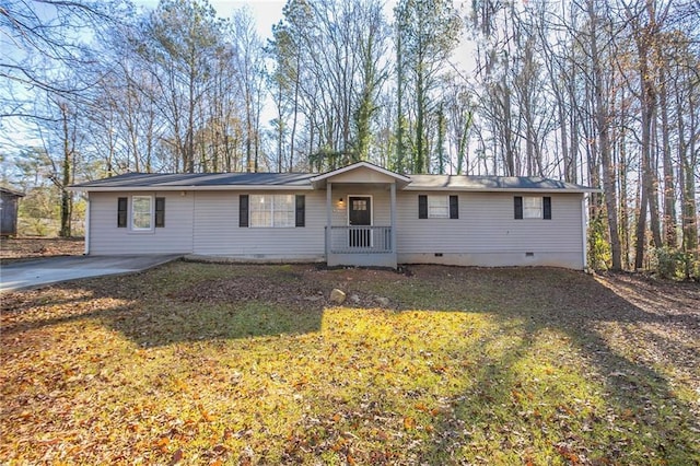 ranch-style home with a front yard